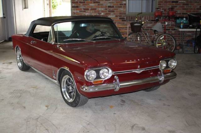 64 corvair black with red interior 2 doors